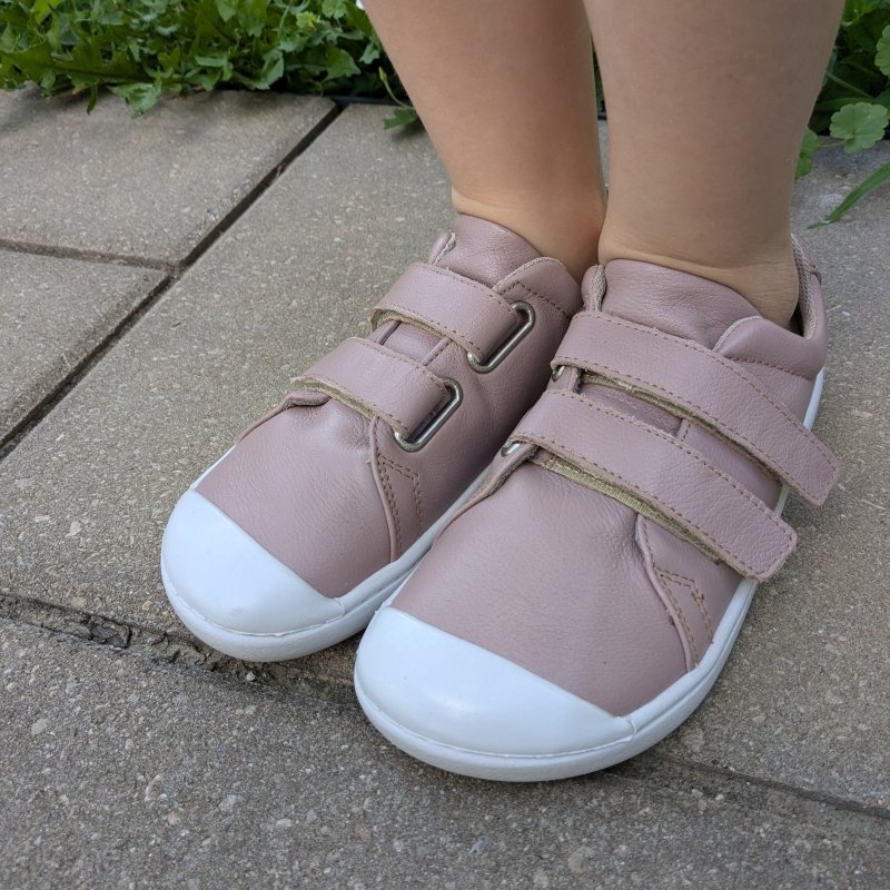 Front angled view of a pair of leather wide toe box barefoot sneakers from Origo Shoes in soft leather with velcro straps