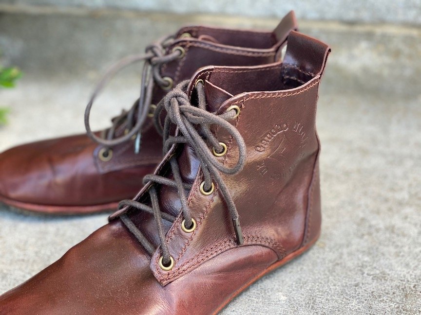 close up of the logo and laces on a Gaucho ninja chukka barefoot handmade boot