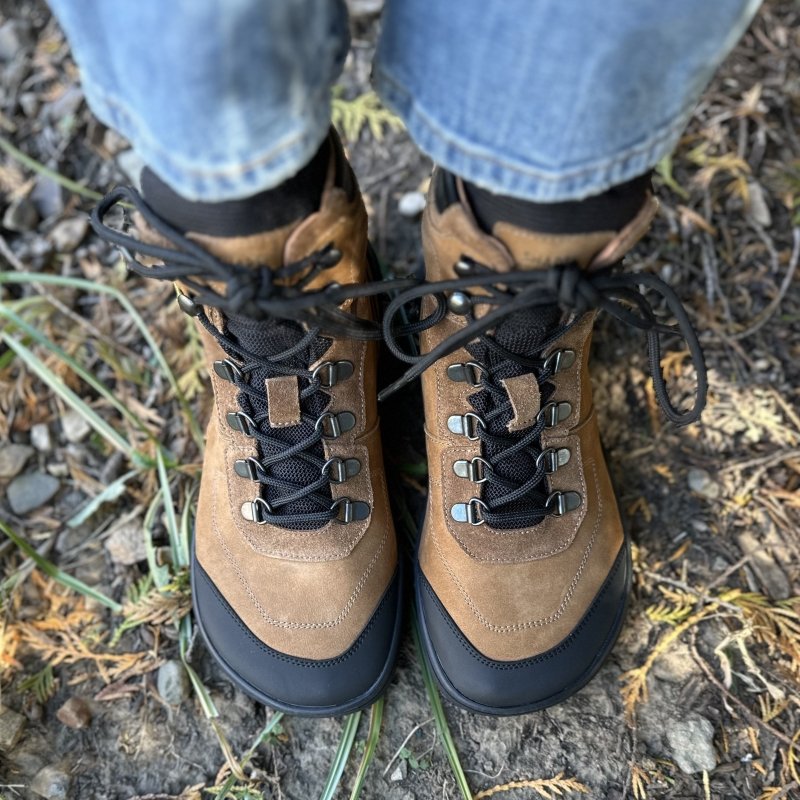 Top down view of Shapen Stormis barefoot hiking boots in brown leather with a black rubber toe guard for the wide toe box