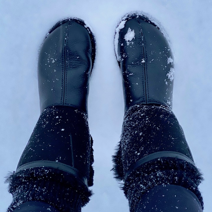 Black leather Softstar Phoenix boots being worn on the snowy ground