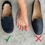 Annotated image showing a wide bare foot between Lisbeth Joe London Loafers and naturalizer conventional tapered heeled loafers that deform your feet.