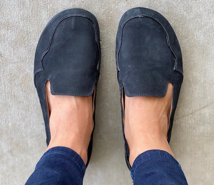 Top down close up of a woman's feet in Lisbeth Joe London Loafers.