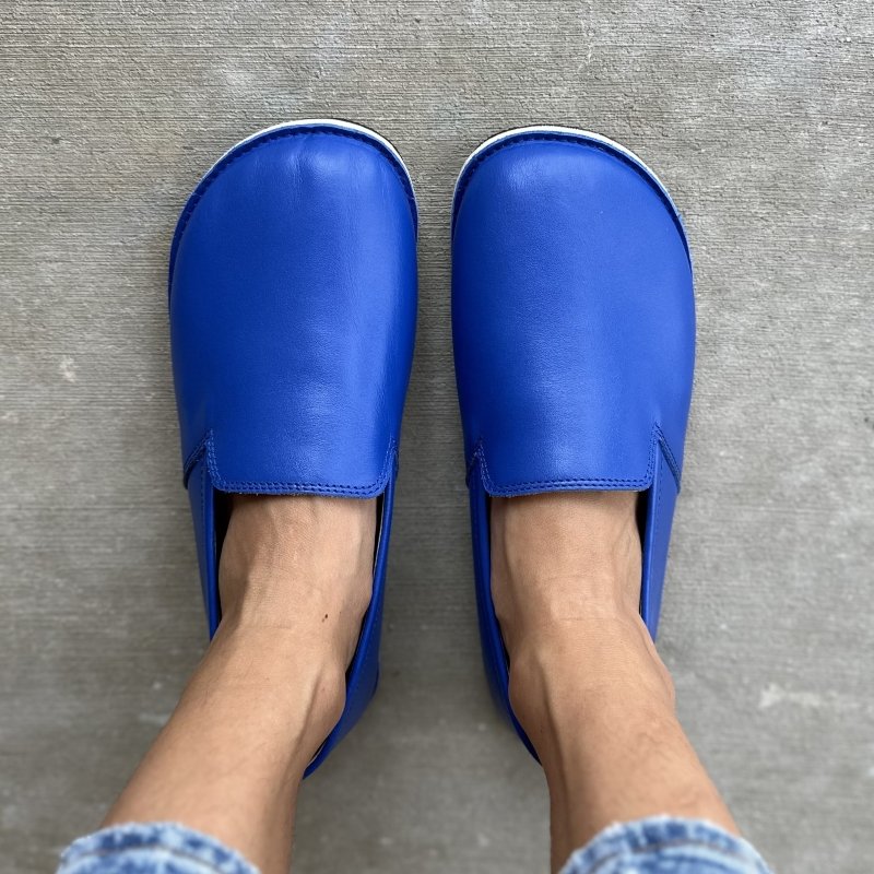 Close up view from the top showing the wide toe box on Ruby Workshop leather loafers in bright blue leather, handmade in Turkey on a zero drop flexible outsole