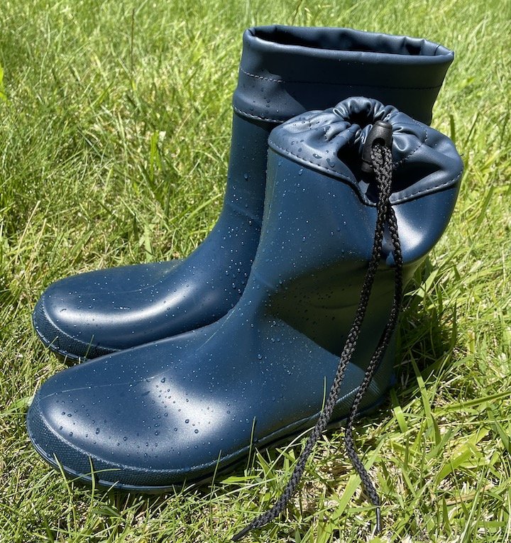 Close up of wet navy blue Asgard rubber boots