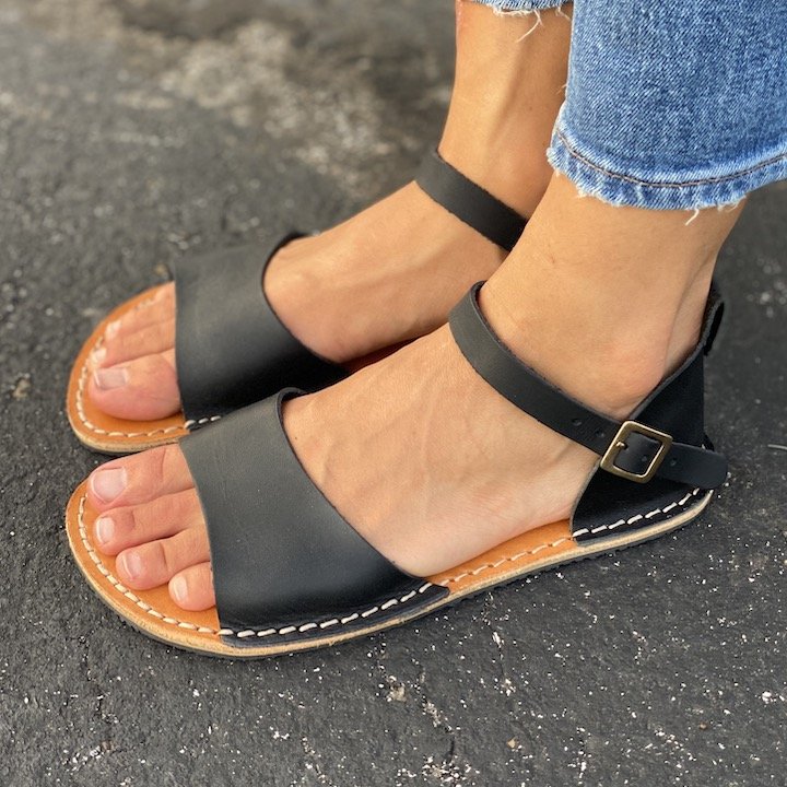 Front/Side angled view of Crupon Febo Barefoot Sandals in Black