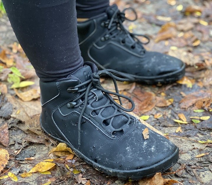 close up of Freet Tundra vegan barefoot hiking boots on wet leaves