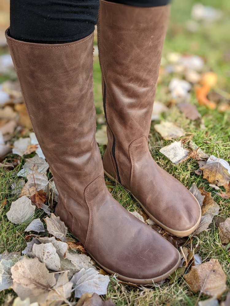 Close up front angled view of Angles Fashion Kairos tall leather barefoot riding style boots with a wide toe box and flexible sole