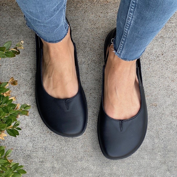 Top down view of Be Lenka Bellissima black leather sling back style flats.