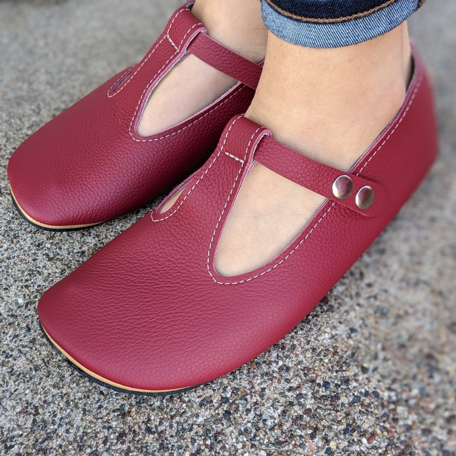 Front angled close up of cranberry closed dress T Straps from Duchess and Fox, handmade soft flexible leather zero drop shoes