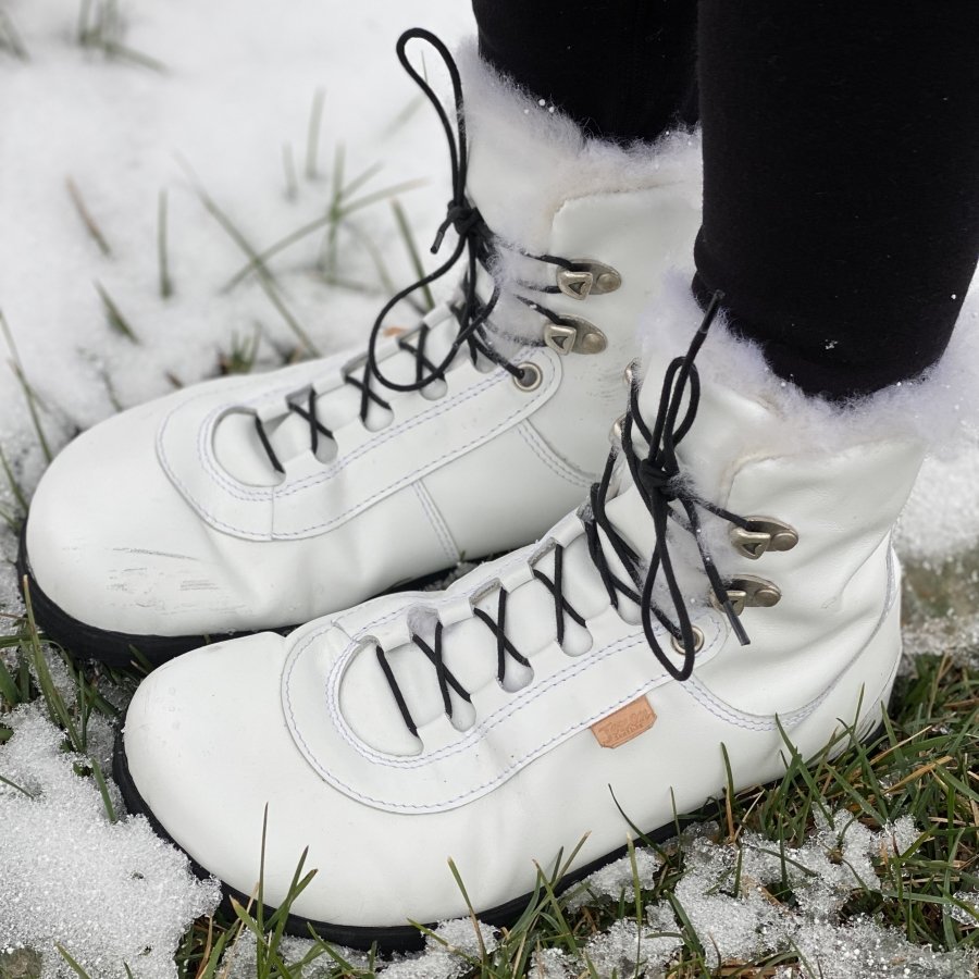 Jenon Leather Snowflake Winter boots review, white leather snow boots with black laces and sheepskin fur standing outside in the snow