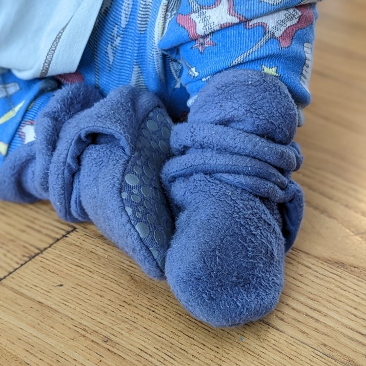 Zutano Gripper soft booties being worn by a toddler