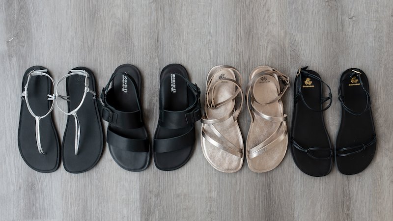 A line of 4 Spring Groundies barefootwear sandals in a variety of strap configurations. Chunky, dainty, strappy, classy leather sandals in black, gold, and silver leather comfortable zero drop soles