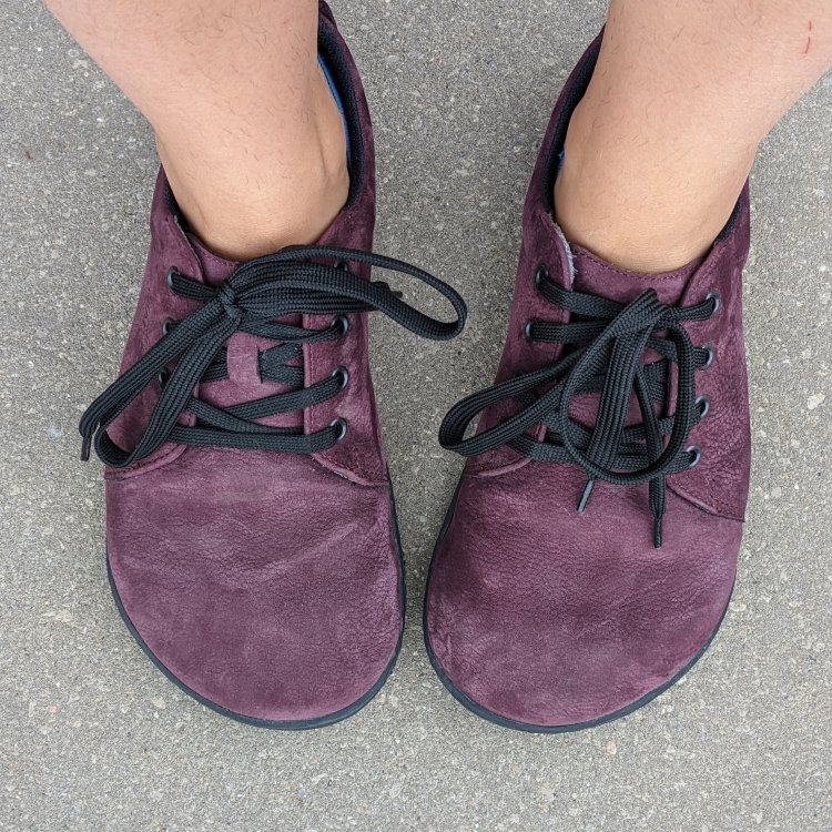 Top down view of extra wide primal shaped toe box on barefoot City Jungle sneakers from Realfoot in purple suede