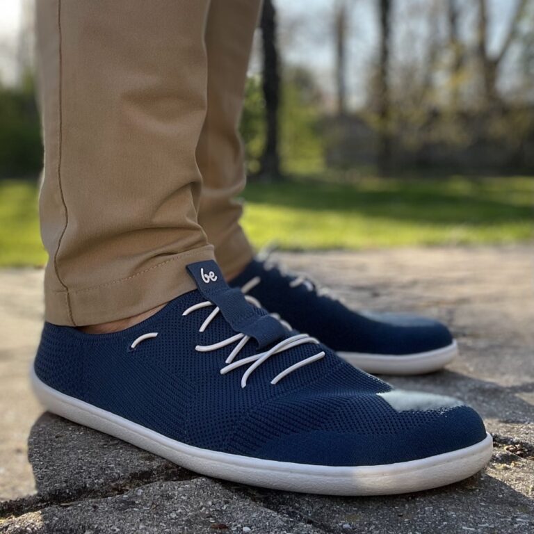 Front angled view of Be Lenka Elevate in navy with faux laces and breathable mesh uppers