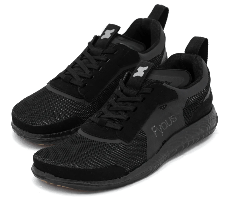 Stock image of a pair of Fyous Custom made trainer sneakers in all black