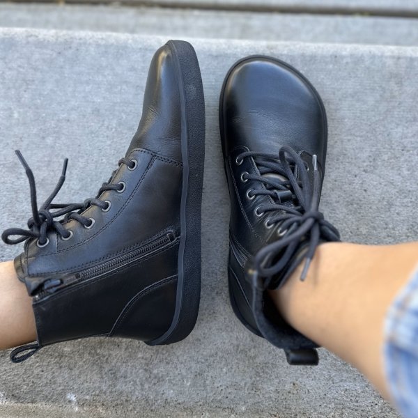 Top down view of the toe box and side view of the zipper and profile of Be Lenka Atlas combat style black high quality leather lace up barefoot boots