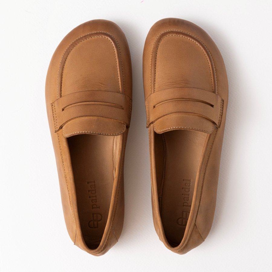 Stock image of a pair of Paidal barefoot smooth leather barefoot loafers in tan