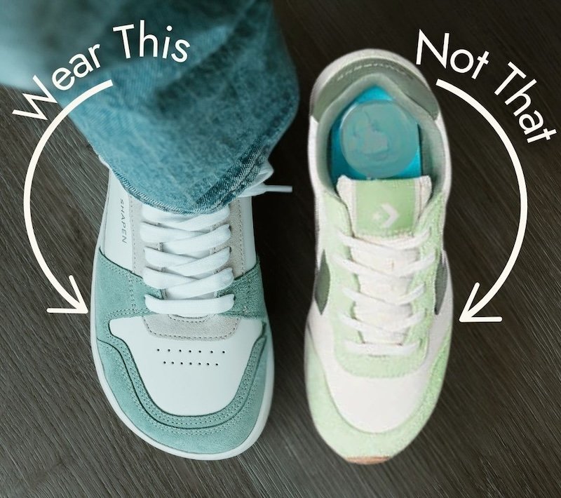 A top down view of two shoes. One is a barefoot shoe, the Shapen Rewind color block retro sneaker next to a similar style shoe but with a pointy toe box. Text over the image is "Wear this" next to the foot shaped shoe and "not that next to the pointy shoe.