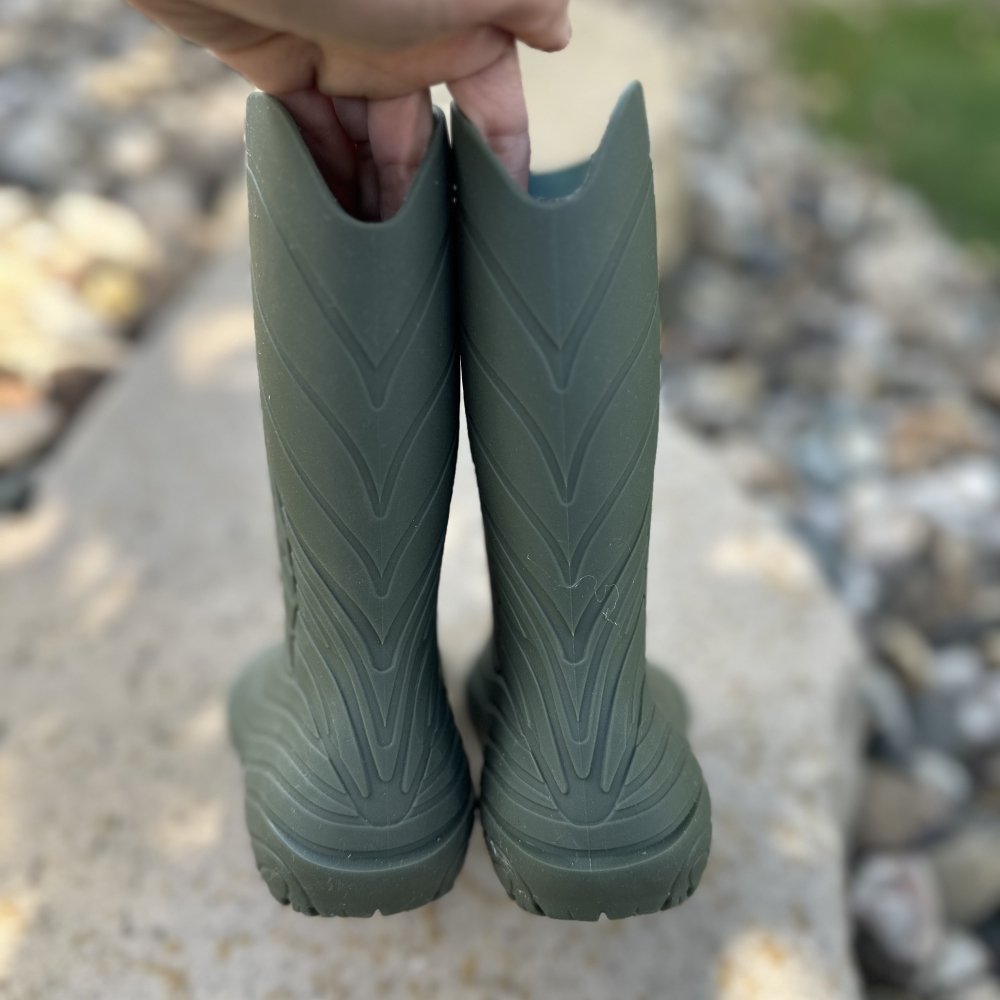 The back shaft on a pair of Wildling Ranidae, 100% rubber barefoot rain boots,