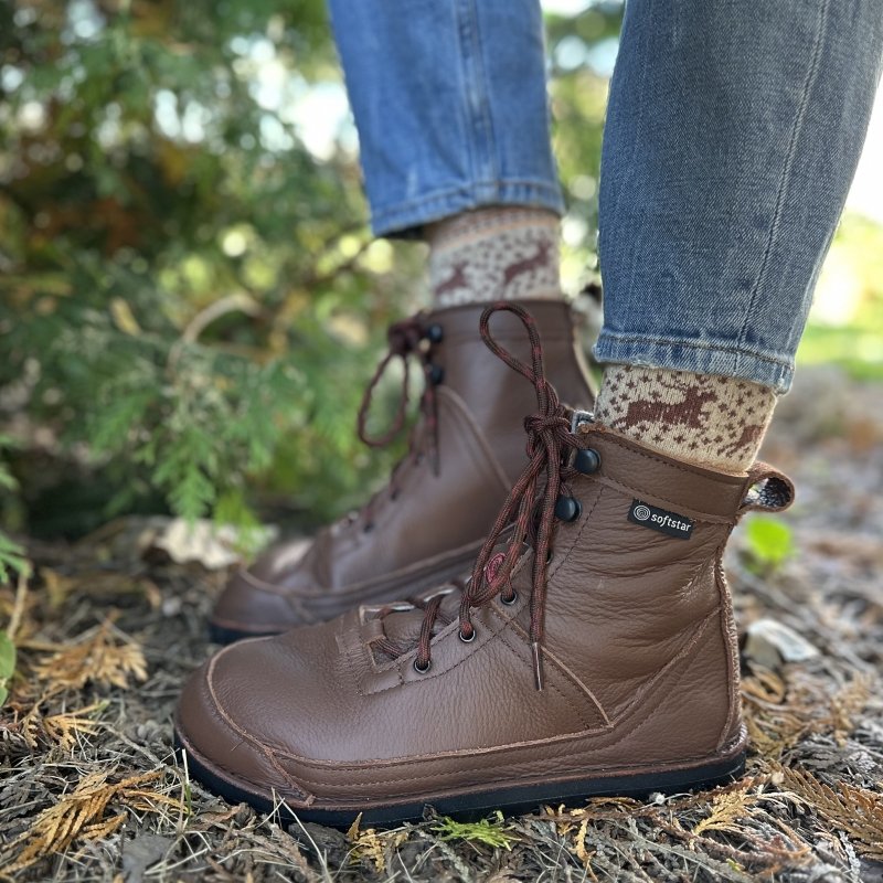 A side view of a pair of feet in Softstar Switchback II leather wide toe box hiking shoes handmade in the USA