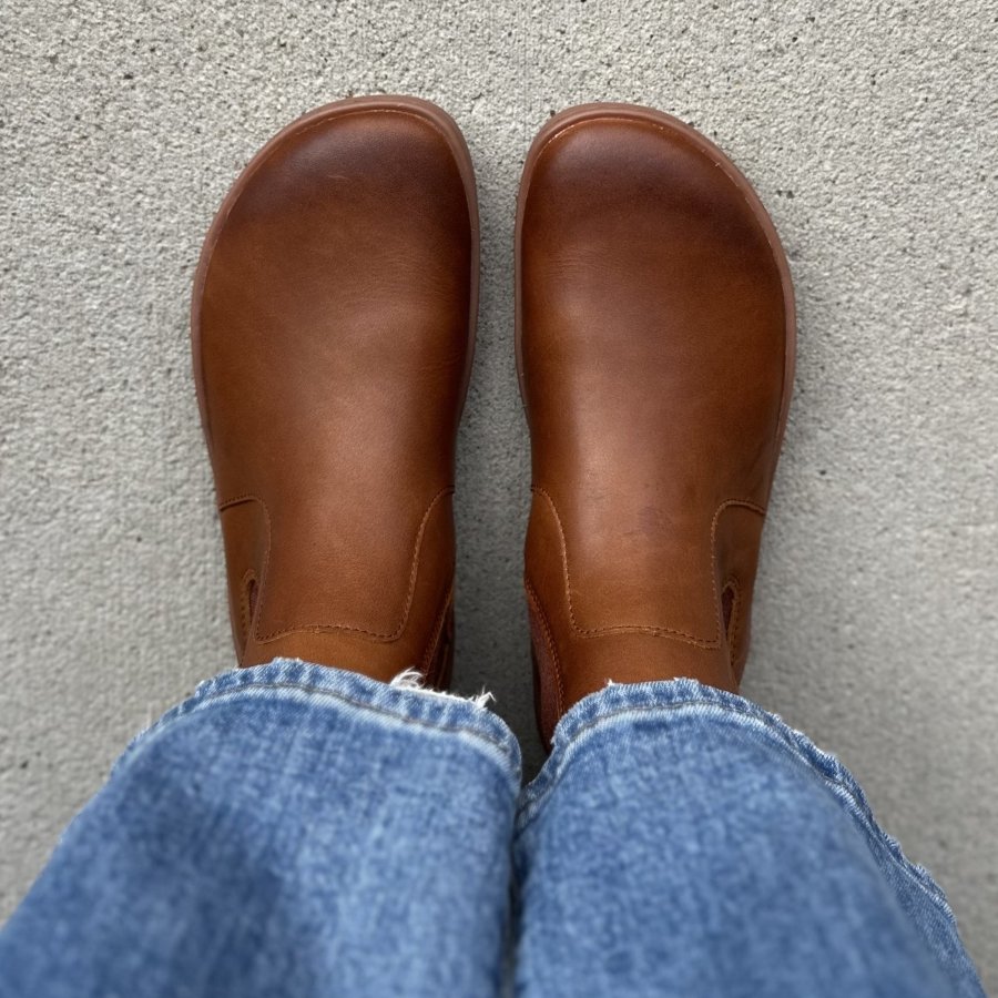 Top down view of brown leather Vivobarefoot Sensus Chelsea boots with a wide toe box and tailored fit.