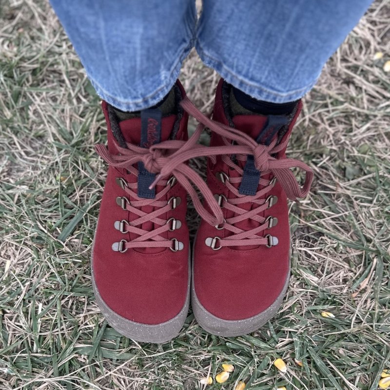 Top down view of a pair of Wildling Shoes Tejo Russet wool lined canvas barefoot winter boots with a wide toe box, sustainable materials, and a flexible outsole.