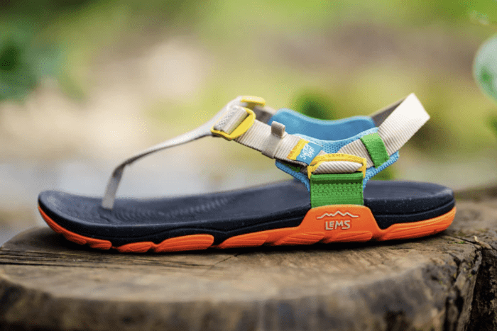 Side photo of one Lems Switchback Knit colorful low drop wide toe box sandals