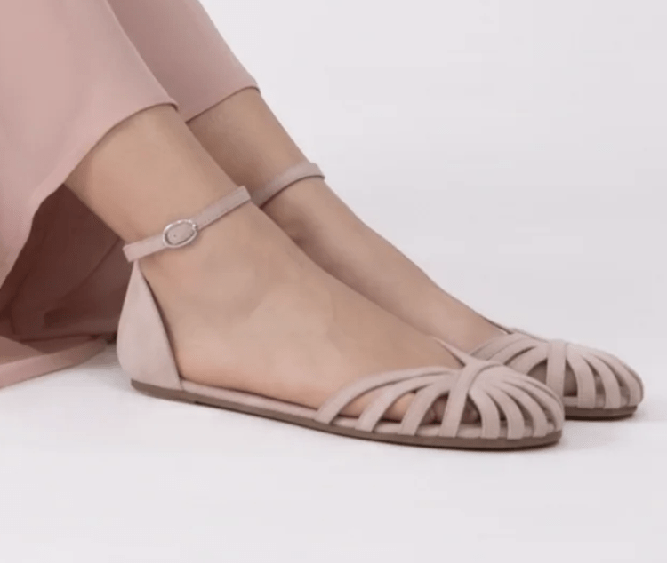 Close up of a pair of Navega fancy barefoot flats for special occasions in a suede sand color.