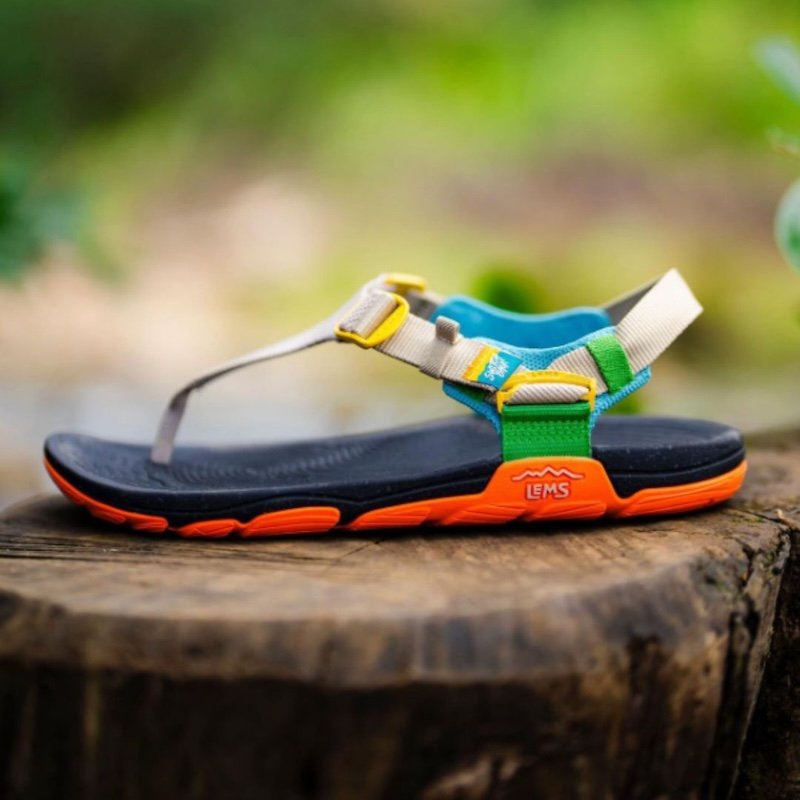 Side photo of one Lems Switchback Knit colorful low drop wide toe box sandals