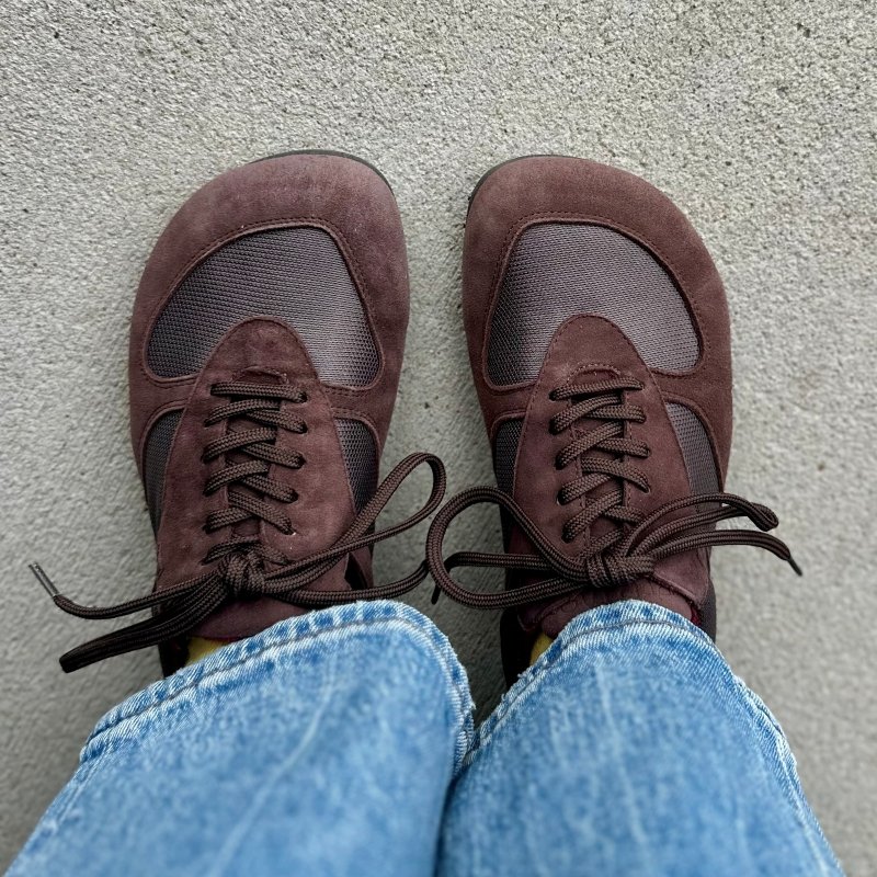A close up view of a top down look at Libertas brown Barellina barefoot sneaker in chocolate brown