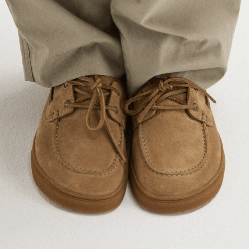 Close up toe box view of a pair of Flamingos Life Zero Boat shoes with a wide toe box and flat outsole