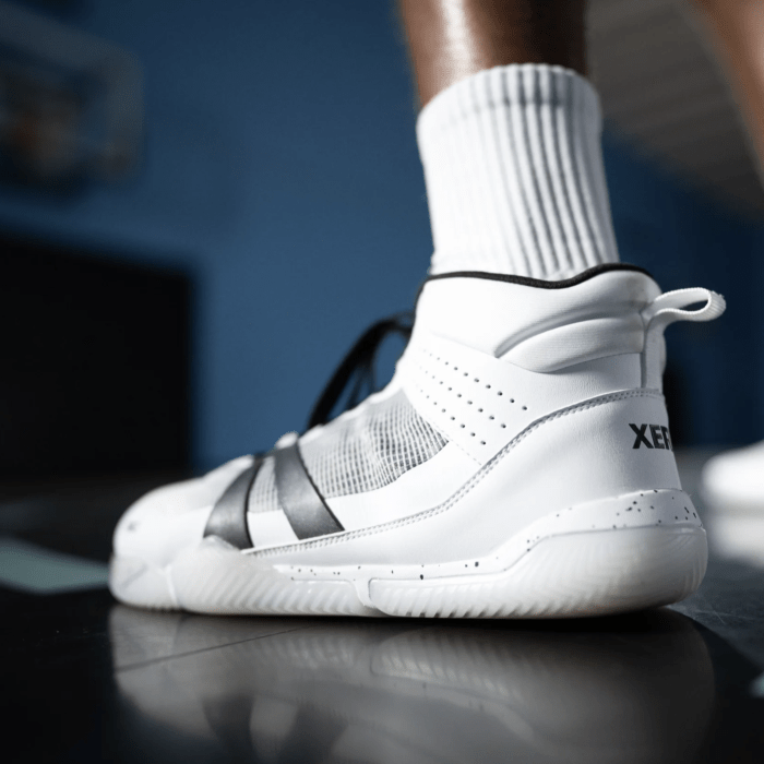 Side back view close up of a pair of Xero X1 Barefoot Basketball Court high top sneakers