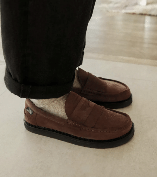 Side view of a person's feet in zero drop comfortable barefoot loafers from Dolfie Paradise. The Duke 2 is shown in brown suede.